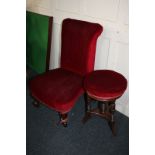 A Victorian piano stool with circular adjustable seat, on turned supports, and a red upholstered