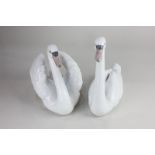 A pair of Lladro porcelain swans, Graceful, 21.5cm high, with a box