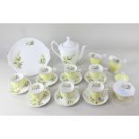 A Royal Albert porcelain coffee set comprising coffee pot, two cream jugs, sugar bowl, seven cups,