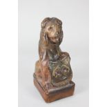 An early 20th century commemorative leather covered model of a lion with Royal Shield marked 1937,