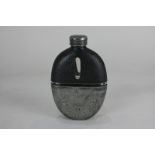 A glass hip flask with screw top, leather mount and engraved silver plated beaker base, 14cm