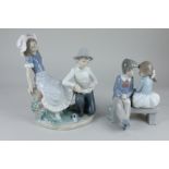 A Nao figure group of a young man tying a bandage round a lady's foot, 22cm, and another of a