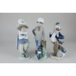 Three Nao figures comprising a clown holding a flower, 21cm, a musketeer, 24.5cm, and a boy with a