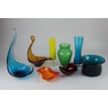 A collection of coloured glass vases, bowls and dishes, to include a blue dish with elongated