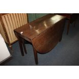 An oak oval drop-leaf table on square legs, 116cm