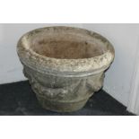 A pair of stone composition garden planters, vase shape cast with foliate swags, 50cm