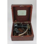 A brass sextant by Cox & Coombes Devonport & Plymouth, inscribed H L P Heard RN, together with