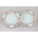 A pair of Minton porcelain plates with reticulated basket weave border and pale green decoration