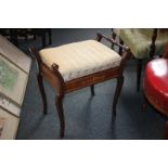 An inlaid Edwardian piano stool with rising box top on cabriole legs (a/f - one rail handle