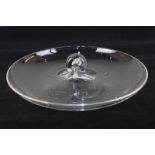 A Steuben Crystal snail handled dish designed by Lloyd Atkins, etched mark to base, 27cm diameter