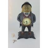 A Bradley & Hubbard John Bull Blinking Eye clock, 39cm high