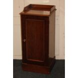 A mahogany pot cupboard with three-quarter gallery back and rectangular shaped top above panel