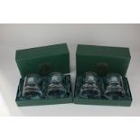 Two boxed pairs of Schott Zwiesel glass tumblers with etched House of Commons design