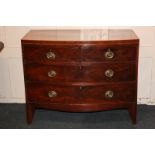 A 19th century inlaid mahogany bow-front chest with satinwood edging, two short over two long