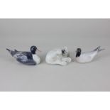 Three Royal Copenhagen porcelain models comprising a duck, 7.5cm, a gull, 6cm, and a polar bear cub,