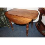 A 19th century circular drop leaf extending mahogany table (no leaves) on turned legs 97cm