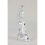 A Baccarat clear glass figure of a female golfer putting, 23cm