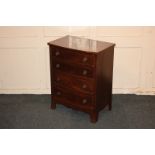 A small mahogany bow front chest of four drawers, on bracket feet, 51cm