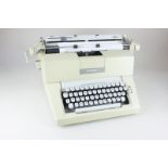 A Hermes 9 cream coloured typewriter, 38cm