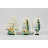 A Clarice Cliff bonjour shaped three-piece cruet decorated with poplar trees, comprising a salt,