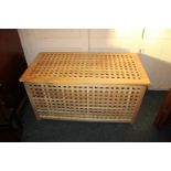 A modern lattice sided blanket box, with rectangular top, in pale wood, 98cm