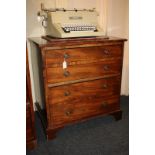 A mahogany small chest of two drawers, with four dummy front drawers and drop ring handles, on
