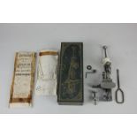 A Moldacot pocket lock-stitch sewing machine in original box with manual