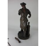 A large spelter figure of a man beside an anvil, 'Industrie', 56cm, (a/f)