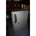 A grey metal Statesman safe with door enclosing shelf, 36cm, with key