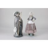 A Lladro porcelain figure of a Dutch girl, marked Daisa 1980, 25cm, together with a Nao figure of