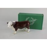 A Beswick model of a Polled Hereford Bull, in brown and white gloss, with ringed nose, 13cm, with