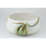 A Clarice Cliff for Newport pottery, porcelain bowl or planter decorated in light relief with leaves