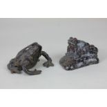 A carved jasper model of a toad, 5cm high, together with a painted metal toad, with paper label