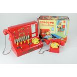 A Codeg Toy-Town telephone exchange with box (a/f), 25cm