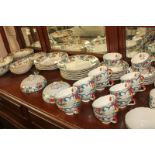 A matched Booths and Royal Cauldon pottery part dinner and tea service in the Floradora pattern,