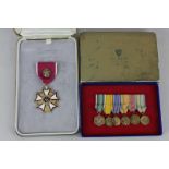 A United States of America Legion of Merit, cased, together with a miniature set of American