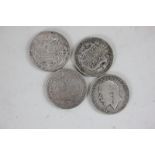 Four George V half crowns