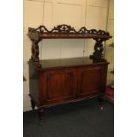 A Victorian mahogany buffet, rectangular top with pierced fret cut gallery and support above