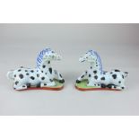 A pair of Vista Alegre porcelain models of horses, the bases marked The Nelson Rockefeller