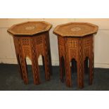 A near pair of Eastern octagonal side tables, raised borders, with mother of pearl and marquetry