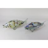 Two similar Venetian coloured glass fish ornaments, largest 35cm