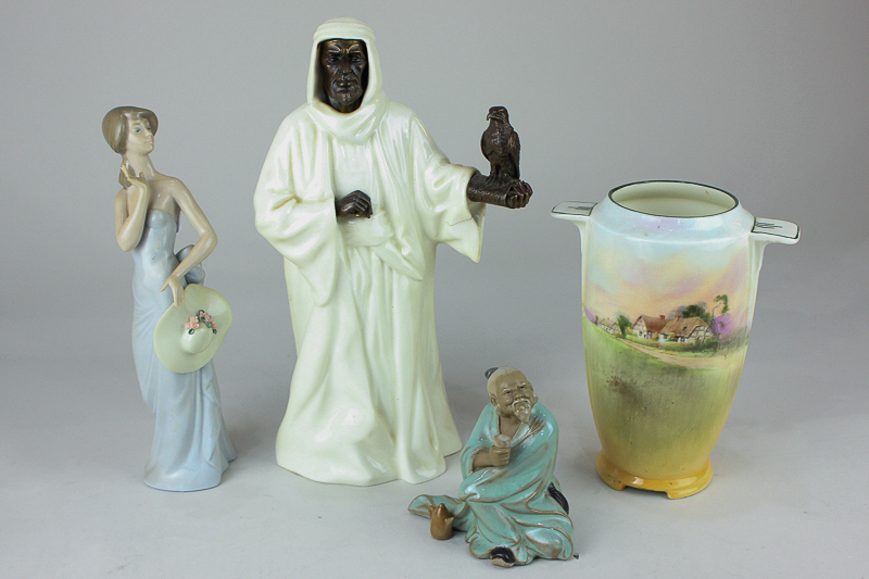 A Minton figure of 'The Sheikh', 25.5cm, together with a Lladro porcelain figure of a lady, 21cm,