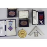 A small collection of Masonic items to include two cased medals, one in silver gilt, together with