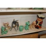 A Wade porcelain Walt Disney model of Bambi, a Wedgwood model of a donkey, three Sylvac dogs a