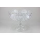 A cut glass pedestal fruit bowl, circular shape with diamond pattern border, on separate base with