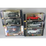 Five Burago die cast model sports cars, 1:18 scale, to include a special edition Ferrari 348ts and