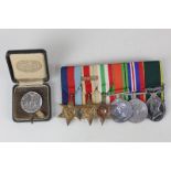 A group of Second World War medals comprising a Territorial Medal for Efficient Service to 1449098