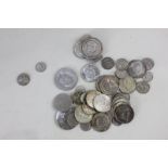 A collection of early 20th century and later American coins, to include dimes, cents, quarter