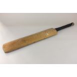 An autographed West Indies Cricket Team bat, including G. Sobers, the reverse with Middlesex,