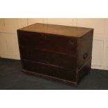A George III rectangular oak trunk, of plain plank construction with moulded edge, later repairs,
